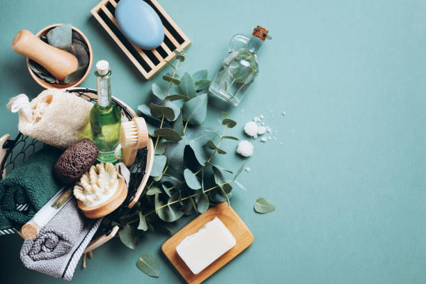istock Massage and spa products with eucalyptus on green background. Zero waste, natural organic bathroom tools. Plastic free life. Ecological skin care, body treatment concept 1166945446