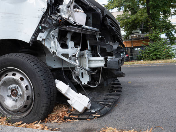 istock Front of white van  damaged by accident 1166950060