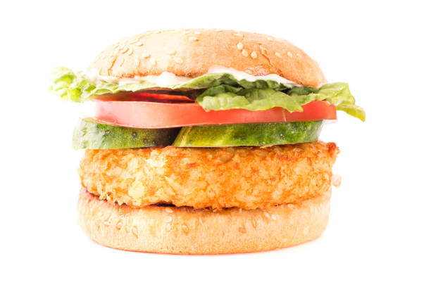 istock Delicious fast food. Big cheeseburger isolated on white background 1166952376