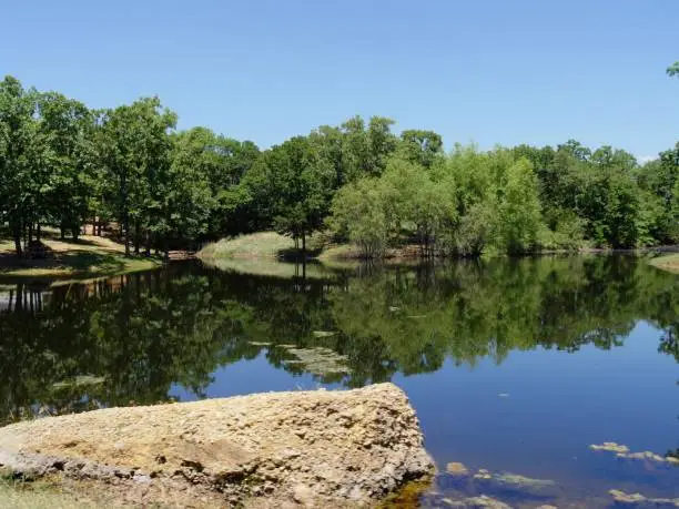 Photo of Scneic view of a small lake at the Chickasaw National Recreation Area in Davis, Oklahoma