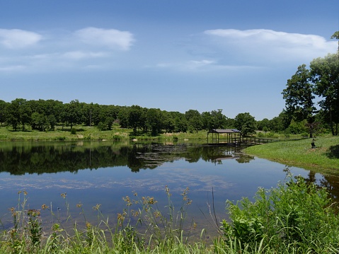 Lake with reflections in the water at Chickasaw National Recreation Area in Davis, Oklahoma