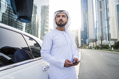 Ararabic businessman wearing kandora - Portrait of traditional emirati man