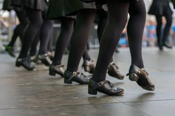 Neustadt in Holstein, Germany - August 4, 2019, European Folklore Festival. Folk Dance Group. traditional dance, Set-Dancing, Irish folk dance in contemporary Irish black shoes