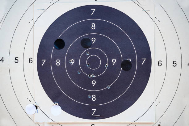 istock White and black target with shooting traces 1166962369