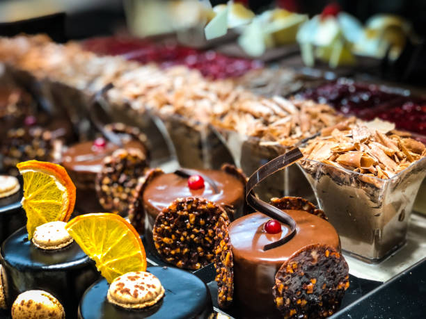 istock artisanal designed sweets - home made cakes, mini cakes, macaroons, eclairs 1166964395