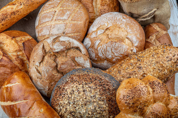 istock Fresh fragrant bread on the table. Food concept 1166968022