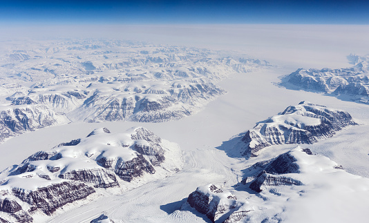 View at Greenland frozen mountains from above