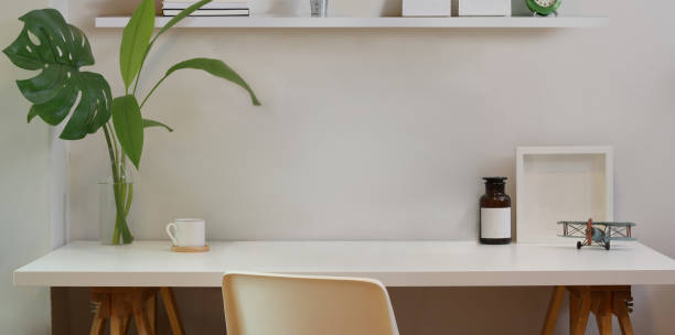 istock Minimal workspace and mock up desk with office supplies 1166971420