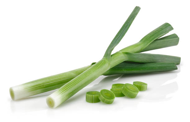 istock Fresh green garlic with slices isolated 1166976389
