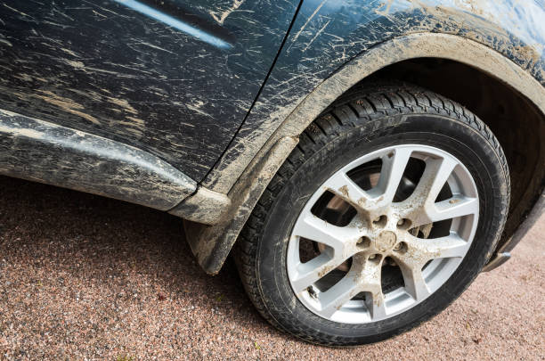 istock Dirty 4x4 SUV car wheel with light alloy disc 1166976607
