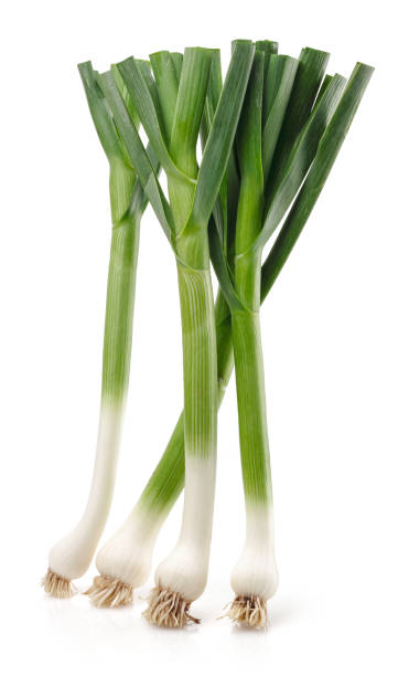 istock Fresh green garlic isolated on white 1166976660