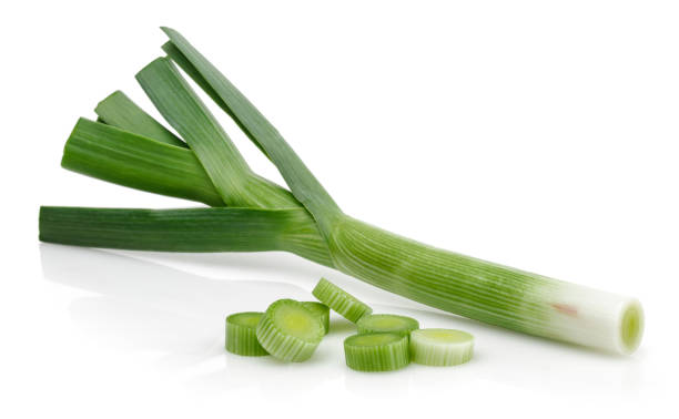 istock Fresh green garlic with slices isolated 1166976668