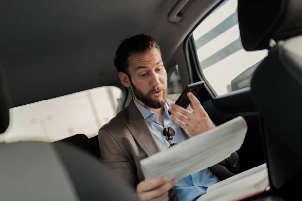 istock Business Executive Traveling by Car 1166977911
