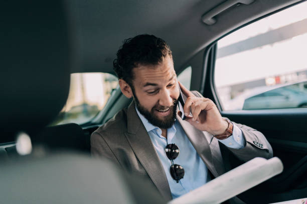 istock Business Executive Traveling by Car 1166978198