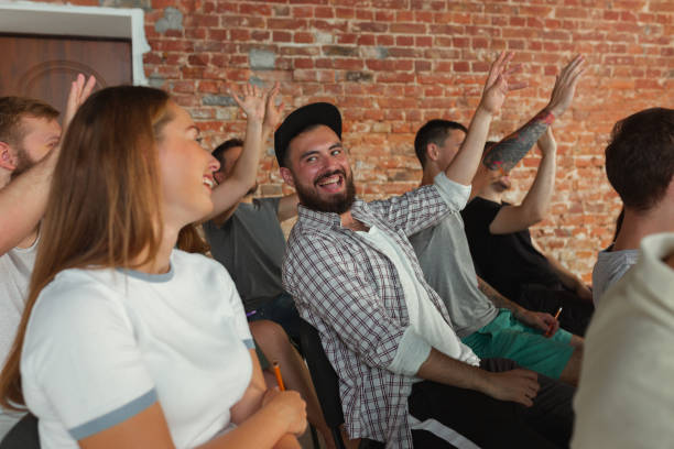 istock Male speaker giving presentation in hall at university workshop 1166979014