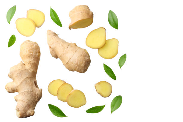 istock sliced ginger with leaves isolated on white background top view 1166979621
