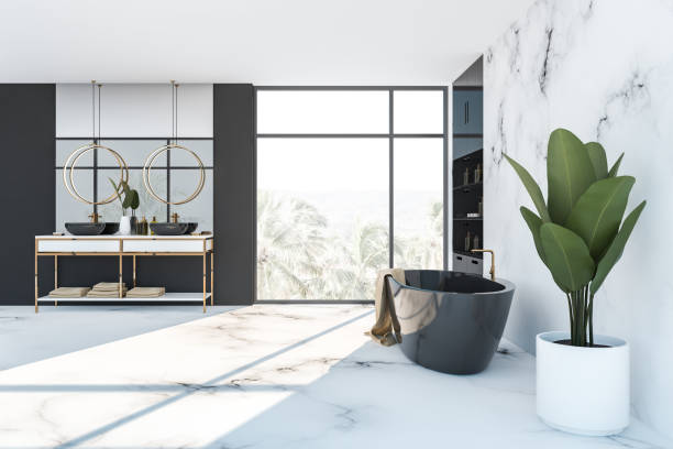 istock Side view of black and white marble bathroom 1166982415