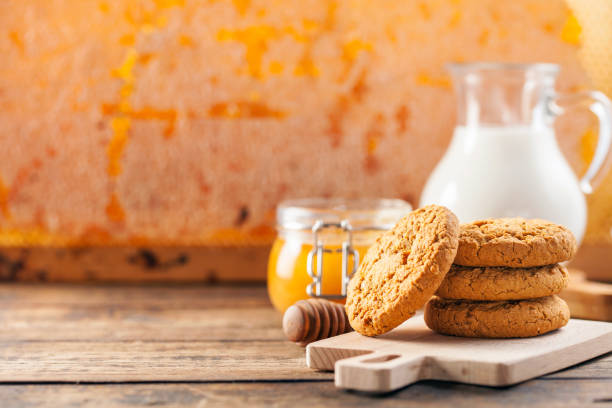 istock Oatmeal cookies with milk and honey 1166982500
