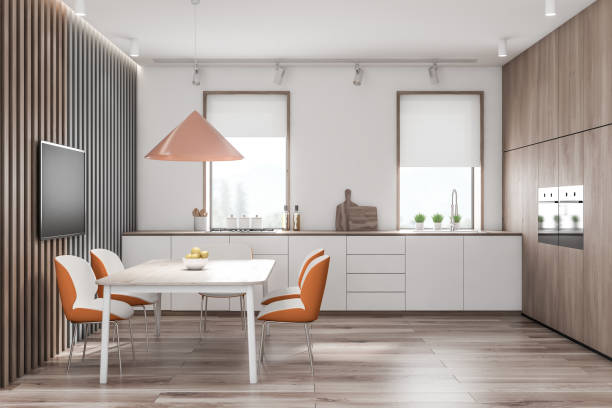 istock White and wooden kitchen interior with TV 1166983424