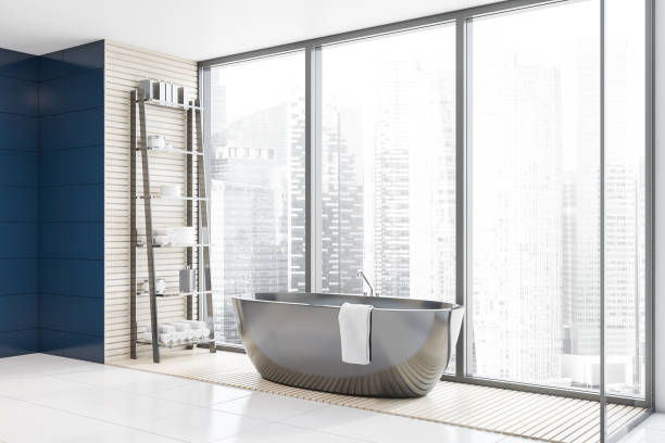 istock Panoramic blue tile bathroom corner with tub 1166983652