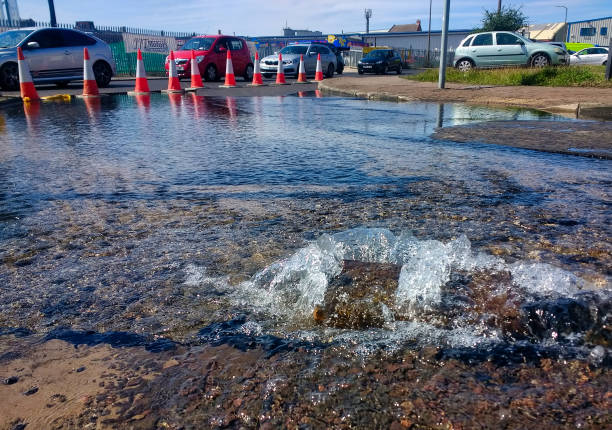 Road closed due to damage from a burst water main Road closed due to damage from a burst water main road closed sign horizontal road nobody stock pictures, royalty-free photos & images