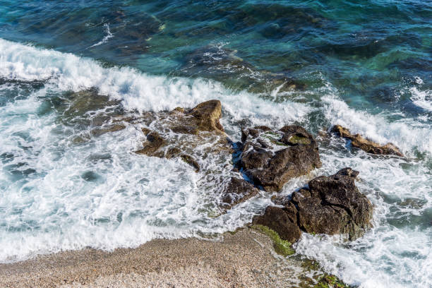 istock Top view of rocky and wavy beach in Mytilene (Lesbos), Greece 1166987321