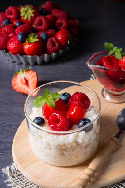 istock delicious milk rice with different berries and red fruit jelly 1166992002