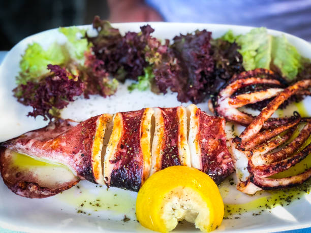 istock fresh grilled squid with lemon and lettuce 1166994479