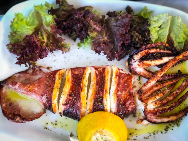 istock fresh grilled squid with lemon and lettuce 1166994480