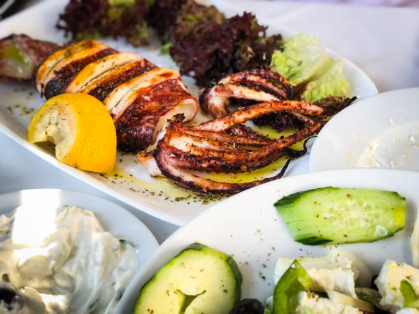 istock fresh grilled squid with lemon and lettuce 1166994482