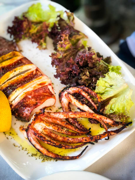 istock fresh grilled squid with lemon and lettuce 1166994483