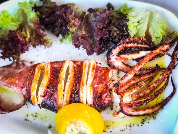 istock fresh grilled squid with lemon and lettuce 1166994485