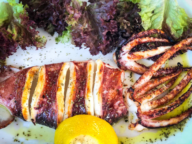 istock fresh grilled squid with lemon and lettuce 1166994567