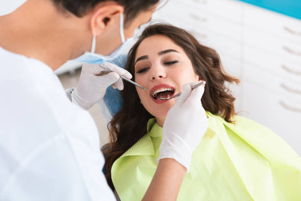istock Young Woman at Dentist 1166994712