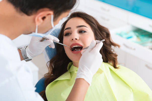 istock Young Woman at Dentist 1166995599