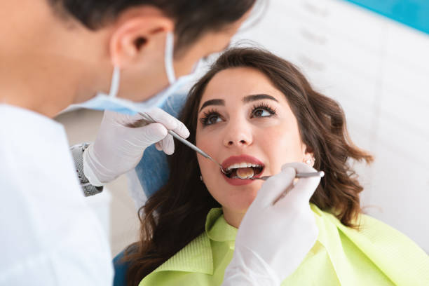 istock Young Woman at Dentist 1166995805