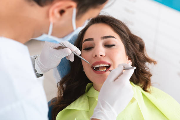 istock Young Woman at Dentist 1166996932