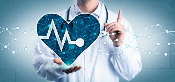 istock Cardiologist Holding AI Aided Virtual Pulse Trace 1166998185