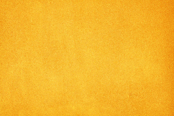 istock Gold concrete wall abstract , colorful rough texture patterns for background 1166998383