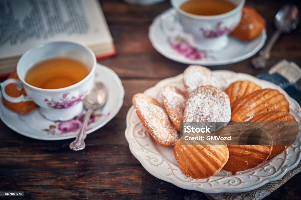 Madeleine Cakes Served with Cup of Tea Tea - Hot Drink Stock Photo