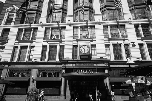 New York, NY, USA - August 9, 2019: Macy’s flagship location at Herald Square showing the clock and plaza on Broadway near 34th Street.