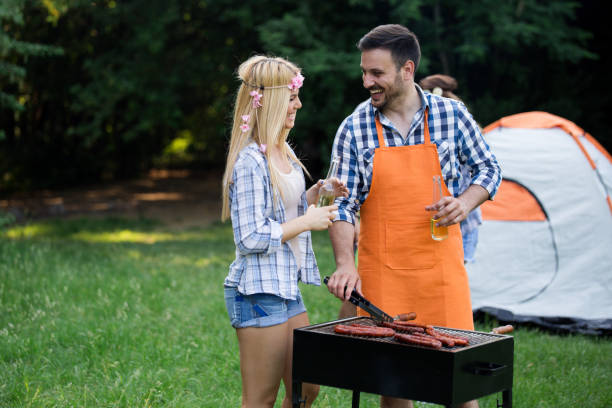 istock Group of friends having fun in nature doing bbq 1167001965