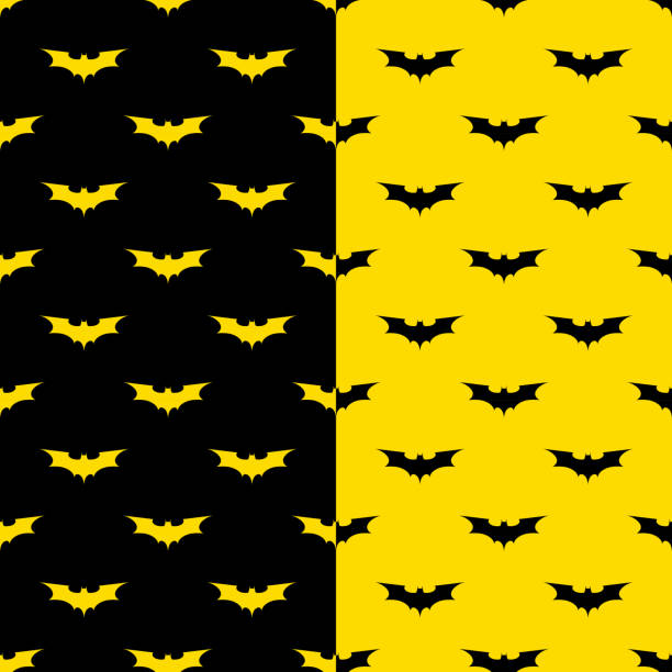 黒と黄色の背景を持つコウモリシームレスなパターン。バットマンシンボルシルエットパターン。休日のハロウィーンの日に装飾のためのデザイン。 - bat vampire silhouette halloween点のイラスト素材／クリップアート素材／マンガ素材／アイコン素材