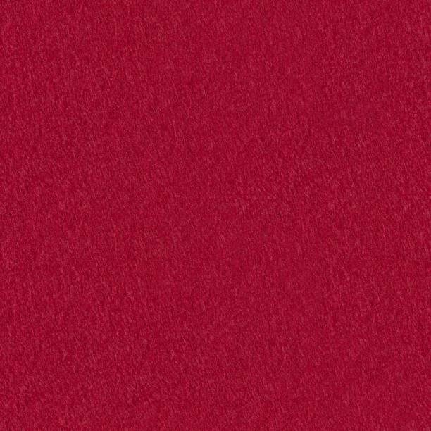 istock Red grunge felt useful for christmas background. Seamless square texture, tile ready. 1167004284