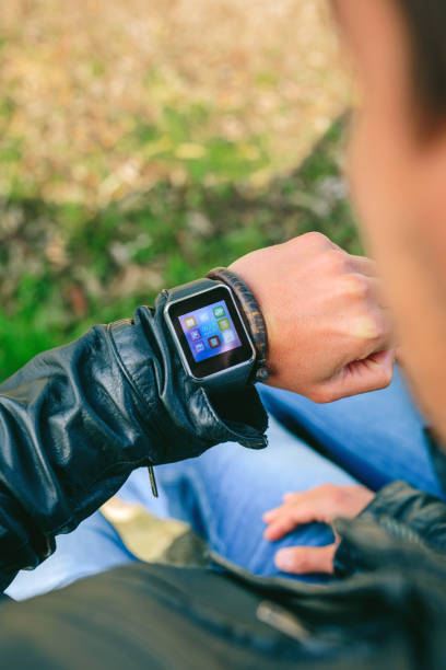 istock Unrecognizable young man looking at his smartwatch 1167008405