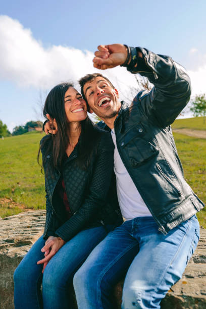 istock Couple taking a selfie with a smartwatch 1167008462