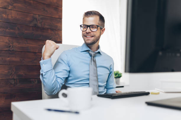 istock Successful businessman working in his office 1167013899