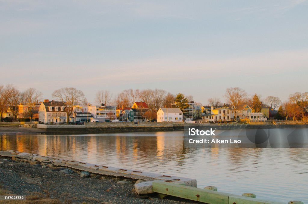 View of Ocean and Homes Ocean view of homes by the water in Massachusetts. Building Exterior Stock Photo