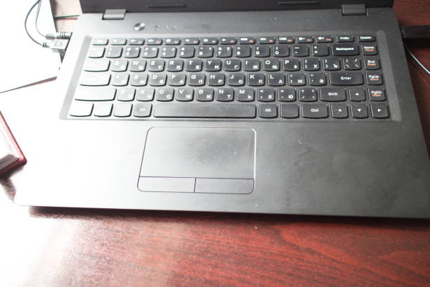 laptop and black mouse on office desk