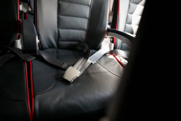 istock seat belt in airplane 1167027692